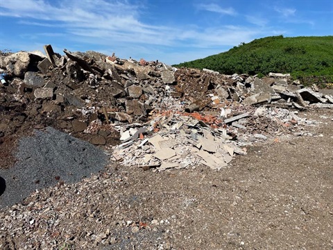 Piles of various construction waste.