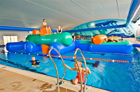 The inflatable obstacle course in the lap pool at GSAC.
