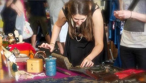 women buying at a market