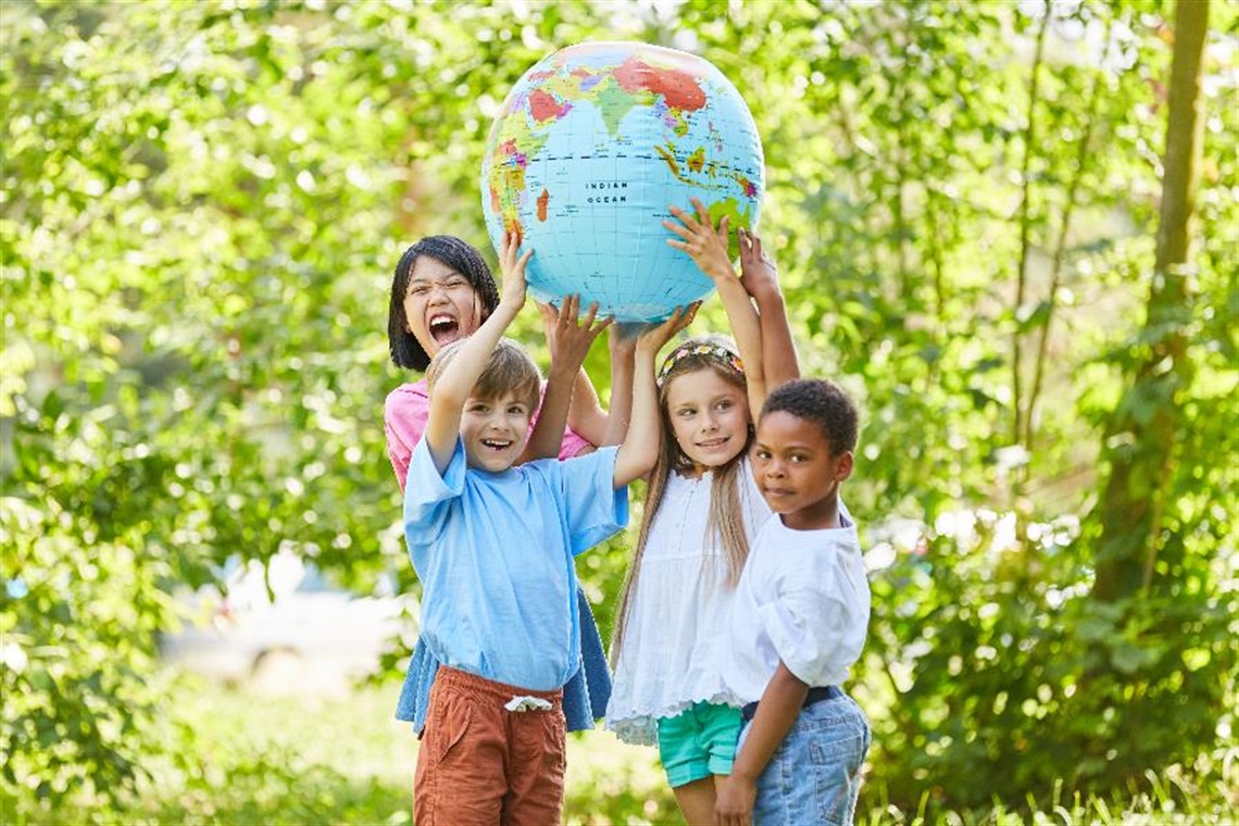 kids-with-a-globe-for-travel-club.jpg